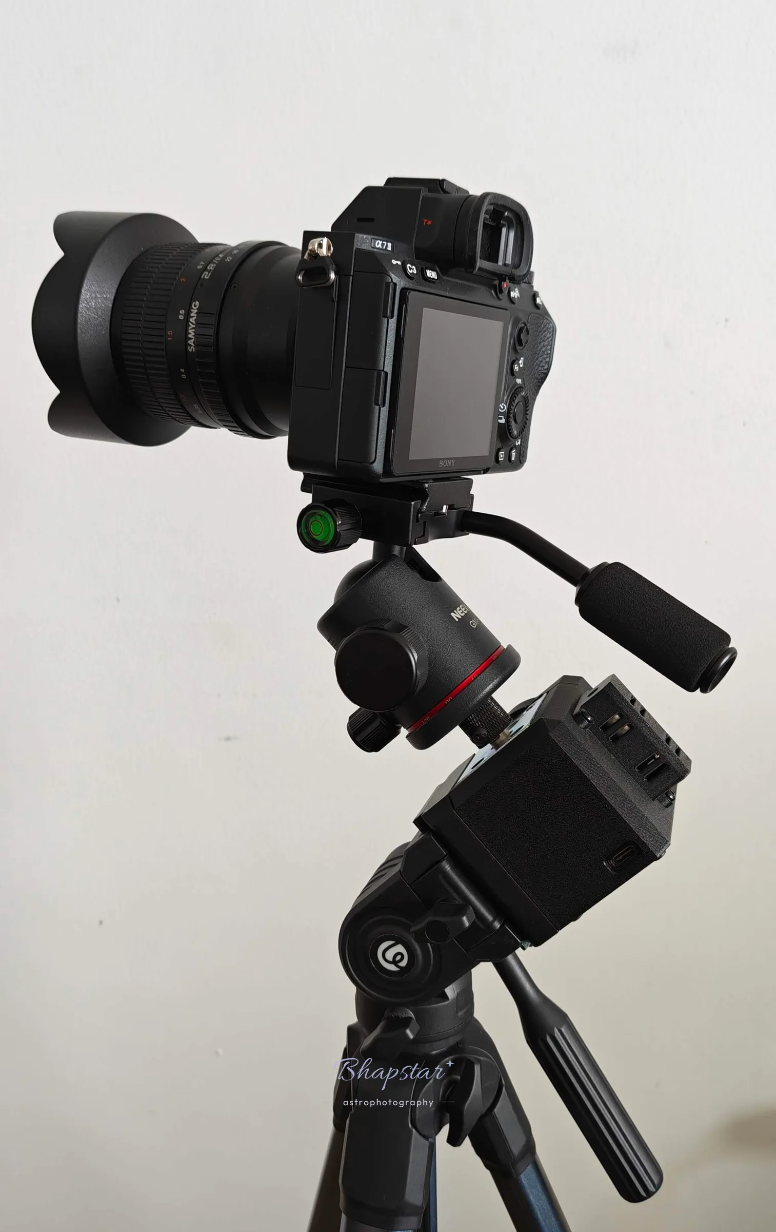 Side view of the TeSeek Nano Light Adventurer with the ball head and camera on top, showing the USB-C power port